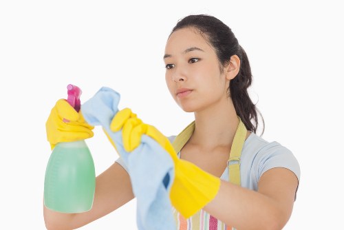 Spot cleaning a mattress stain with a cloth