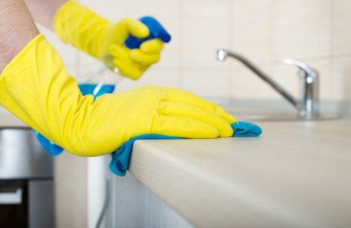 Steam carpet cleaning process removing stains from high-traffic carpet